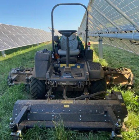 Mower in solar panels Fontenoy